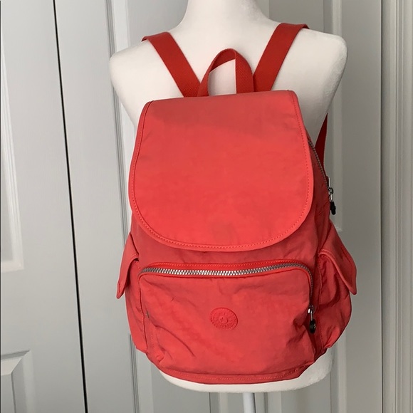 Kipling Handbags - Kipling "Ravier" medium coral backpack